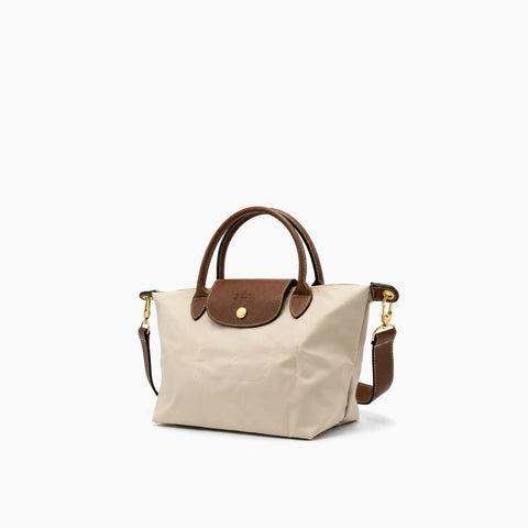 Le Pliage Neo: Beige avec des détails en cuir marron