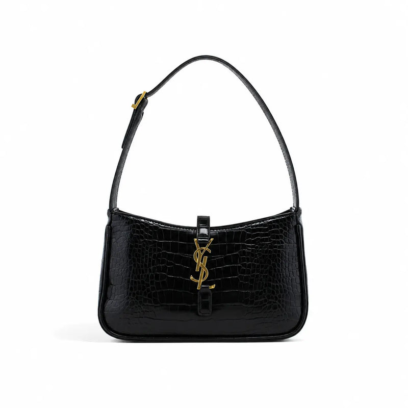 Saint Laurent : Noir élégant avec détails dorés