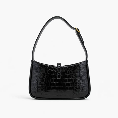 Saint Laurent : Noir élégant avec détails dorés