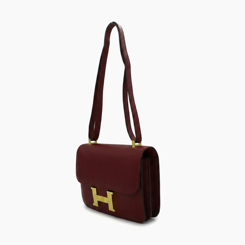 Hermès Constance: Bordeaux foncéet doré-
