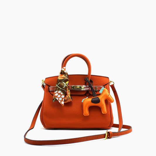Birkin d'Hermès Cuir orange et accessoires marron et orange/mini sac