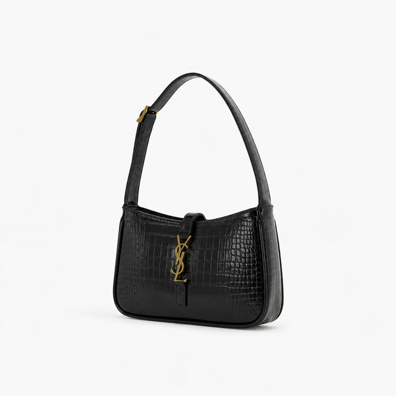 Saint Laurent : Noir élégant avec détails dorés