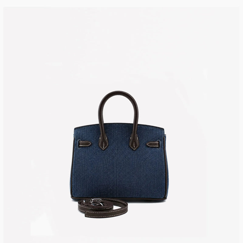 Birkin d'Hermès Jean bleu marine en cuir marron foncé