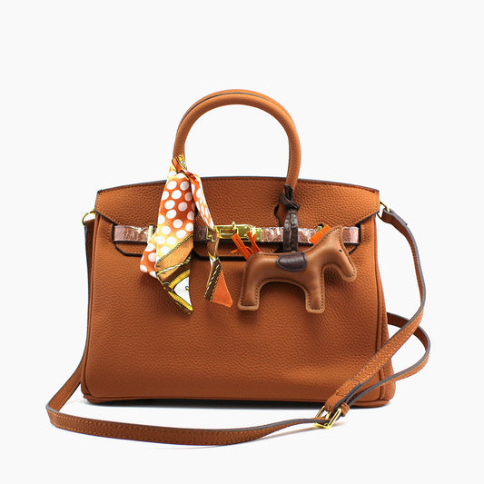Birkin d'Hermès Cuir camel et accessoires orange