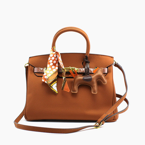 Birkin d'Hermès Cuir camel et accessoires orange