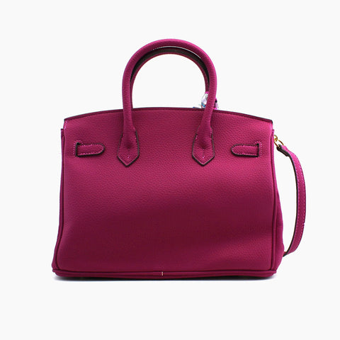 Birkin d'Hermès Cuir rose fuchsia et accessoires rose et blanc.