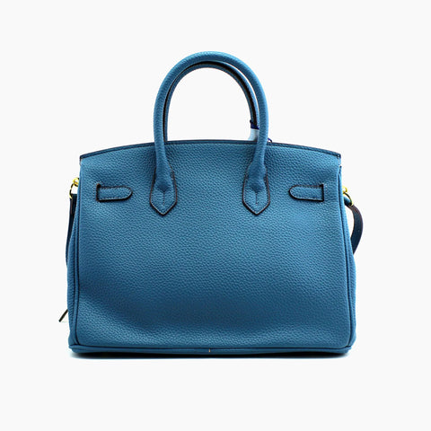 Birkin d'Hermès Cuir bleu jeans et accessoires bleu et jaune.