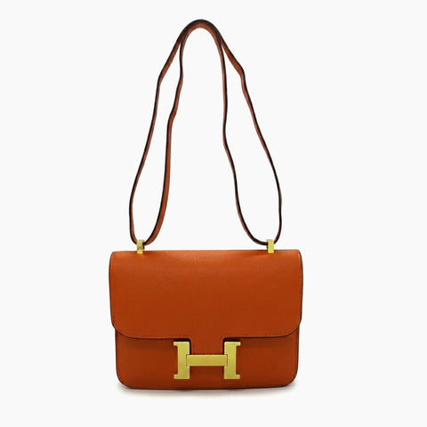 Hermès Constance: Orange cognac et doré-