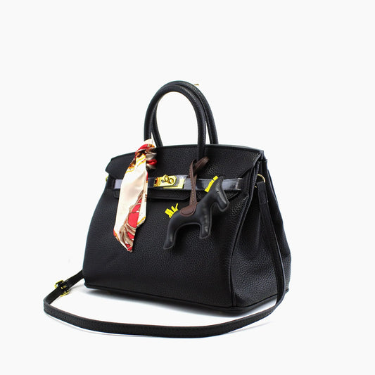 Birkin d'Hermès Cuir noir et accessoires noir et blanc