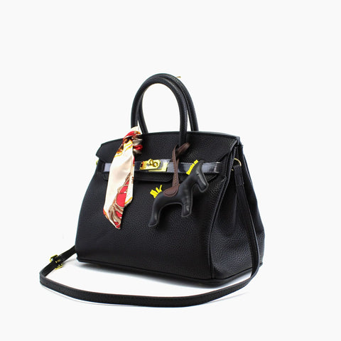Birkin d'Hermès Cuir noir et accessoires noir et blanc