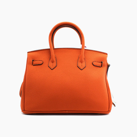 Birkin d'Hermès Cuir orange et accessoires blanc et violet