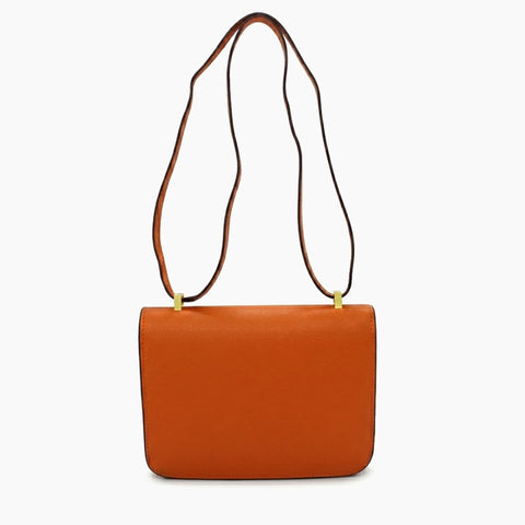 Hermès Constance: Orange cognac et doré-